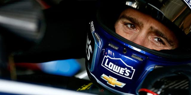 DOVER, DE - MAY 14: Jimmie Johnson, driver of the #48 Lowe's Chevrolet, sits in his car during practice for the NASCAR Sprint Cup Series AAA Drive For Autism at Dover International Speedway on May 14, 2016 in Dover, Delaware. (Photo by Jeff Zelevansky/NASCAR via Getty Images)