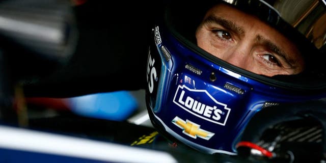 DOVER, DE - MAY 14: Jimmie Johnson, driver of the #48 Lowe's Chevrolet, sits in his car during practice for the NASCAR Sprint Cup Series AAA Drive For Autism at Dover International Speedway on May 14, 2016 in Dover, Delaware. (Photo by Jeff Zelevansky/NASCAR via Getty Images)