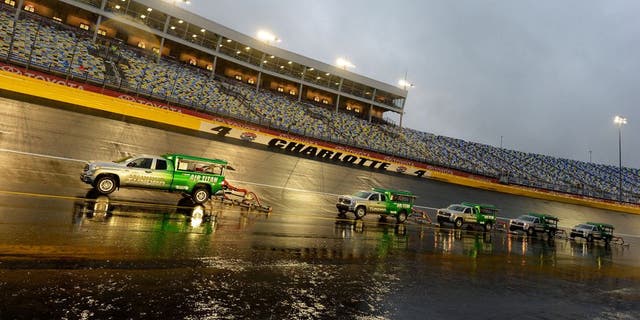 CHARLOTTE, NC - OCTOBER 10: Air-titans sit ready during a rain delay for the NASCAR Sprint Cup Series Bank of America 500 at Charlotte Motor Speedway on October 10, 2015 in Charlotte, North Carolina. (Photo by Robert Laberge/Getty Images)
