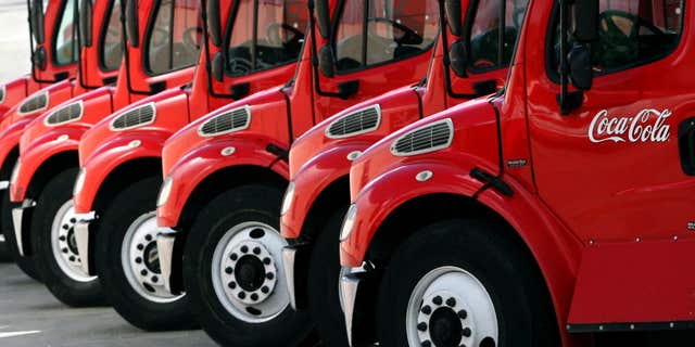 Oct. 26, 2006: Coca-Cola supply trucks park in a distribution center in Caracas.