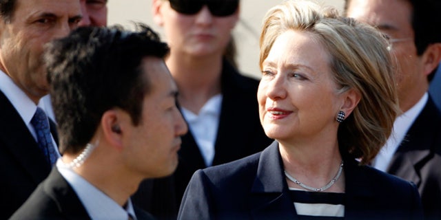 May 21: Secretary of State Hillary Rodham Clinton arrives at Haneda international airport in Tokyo.