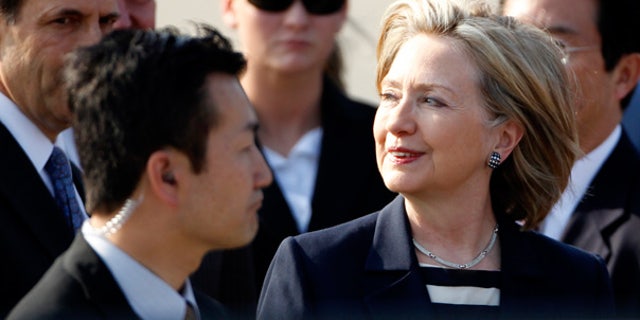 May 21: Secretary of State Hillary Rodham Clinton arrives at Haneda international airport in Tokyo.