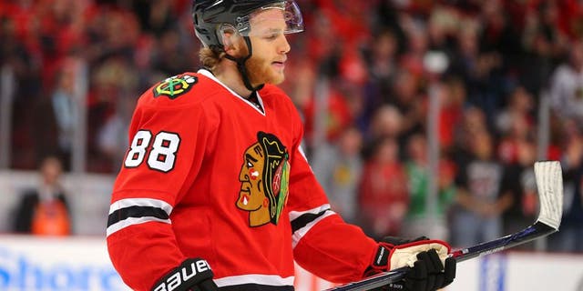 May 21, 2015; Chicago, IL, USA; Chicago Blackhawks right wing Patrick Kane (88) celebrates after scoring in the first period in game three of the Western Conference Final of the 2015 Stanley Cup Playoffs against the Anaheim Ducks at United Center. Mandatory Credit: Dennis Wierzbicki-USA TODAY Sports
