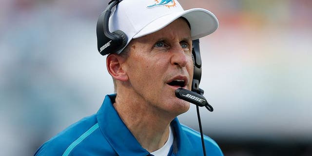 MIAMI GARDENS, FL - DECEMBER 21: Head coach Joe Philbin of the Miami Dolphins watches a replay during fourth quarter action against the Minnesota Vikings on December 21, 2014 at Sun Life Stadium in Miami Gardens, Florida. The Dolphins defeated the Vikings 37-35. (Photo by Joel Auerbach/Getty Images)