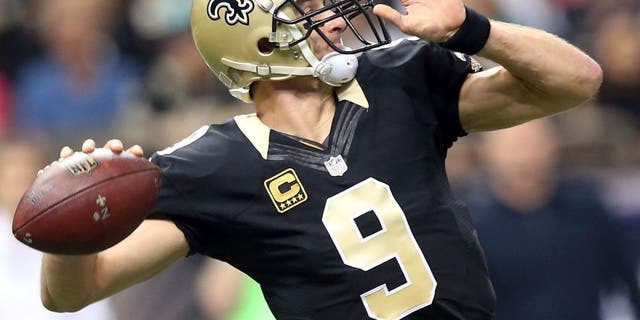 NEW ORLEANS, LA - DECEMBER 27: Drew Brees #9 of the New Orleans Saints drops back to pass during a game against the Jacksonville Jaguars at the Mercedes-Benz Superdome on December 27, 2015 in New Orleans, Louisiana. (Photo by Sean Gardner/Getty Images)