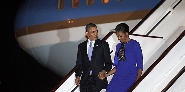 May 23: President Barack Obama and first lady Michelle Obama step off Air Force One as they arrive at London's Stansted Airport.