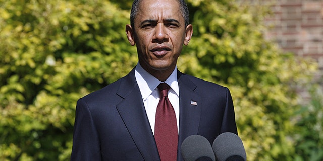 May 24: President Obama makes a statement to reporters about tornado damage in the United States at Winfield House in London.