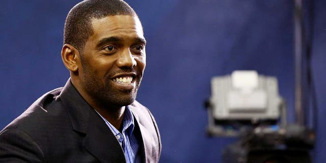NEWARK, NJ - JANUARY 28: Former NFL player Randy Moss attends Super Bowl XLVIII Media Day at the Prudential Center on January 28, 2014 in Newark, New Jersey. Super Bowl XLVIII will be played between the Seattle Seahawks and the Denver Broncos on February 2. (Photo by Elsa/Getty Images)