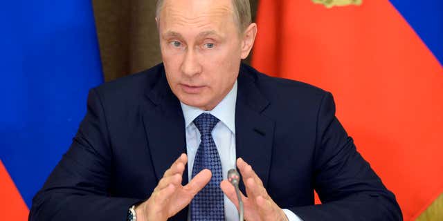 May 12, 2015: Russian President Vladimir Putin speaks at a meeting with representatives of top military brass and defense industries at the Bocharov Ruchei residence in the Black Sea resort of Sochi, Russia.