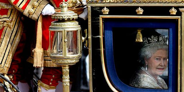 May 25: Britain's Queen Elizabeth II travels in a carriage to the Houses of Parliament in London for the State Opening of parliament