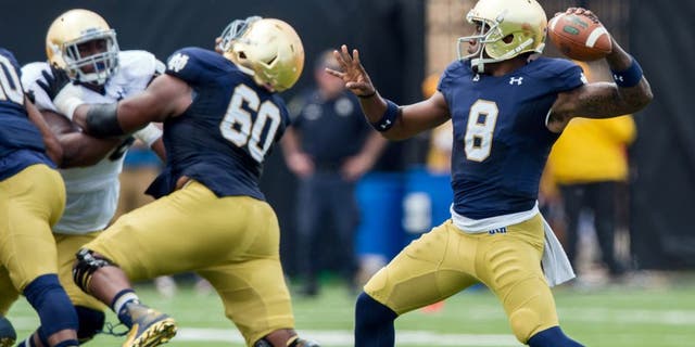 Apr 18, 2015; Notre Dame, IN, USA; Notre Dame Fighting Irish quarterback Malik Zaire (8) throws in the first quarter of the Blue-Gold Game at the LaBar Practice Complex. Mandatory Credit: Matt Cashore-USA TODAY Sports