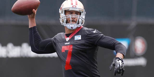 May 21, 2015: San Francisco 49ers quarterback Colin Kaepernick throws the ball during NFL football practice.