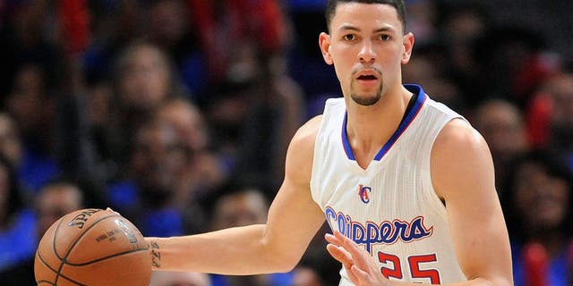 May 8, 2015; Los Angeles, CA, USA; Los Angeles Clippers guard Austin Rivers (25) controls the ball against the Houston Rockets during the second half in game three of the second round of the NBA Playoffs. at Staples Center. Mandatory Credit: Gary A. Vasquez-USA TODAY Sports