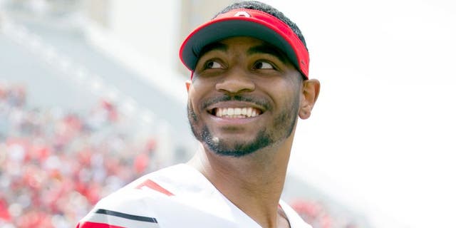 Apr 18, 2015; Columbus, OH, USA; Ohio State Gray Team quarterback Braxton Miller (5) reacts to the fans during the Ohio Spring Game at Ohio Stadium. Mandatory Credit: Greg Bartram-USA TODAY Sports