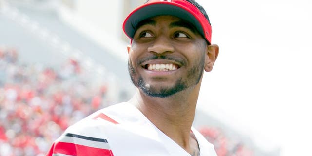 Apr 18, 2015; Columbus, OH, USA; Ohio State Gray Team quarterback Braxton Miller (5) reacts to the fans during the Ohio Spring Game at Ohio Stadium. Mandatory Credit: Greg Bartram-USA TODAY Sports