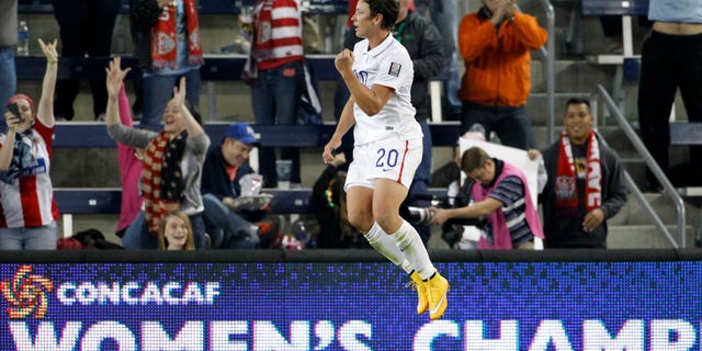 Abby Wambach celebrates her goal against Trinidad and Tobago in this Oct. 15, 2014, file photo.