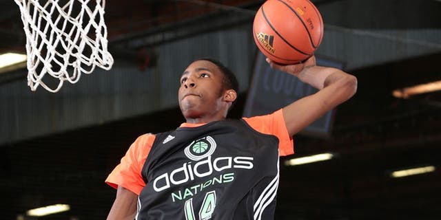 GARDEN GROVE, CA - AUGUST 1: Derrick Jones #14 with the dunk during the 2014 adidas Nations on August 1, 2014 at Next Level Sports Complex in Garden Grove, California. (Photo by Kelly Kline/Getty Images)