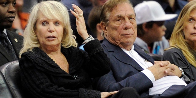 Nov. 12, 2010: Shelly Sterling sits with her husband, Donald Sterling, right, during the Los Angeles Clippers' NBA basketball game against the Detroit Pistons in Los Angeles. (AP/Mark J. Terrill, File)