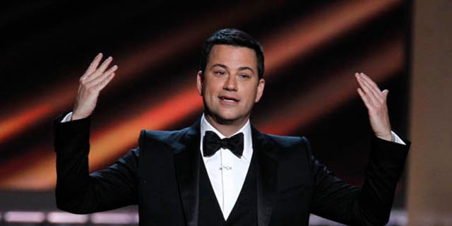 Host Jimmy Kimmel opens the show at the 64th Primetime Emmy Awards in Los Angeles, September 23, 2012.   REUTERS/Lucy Nicholson (UNITED STATES  - Tags: ENTERTAINMENT)  (EMMYS-SHOW)
