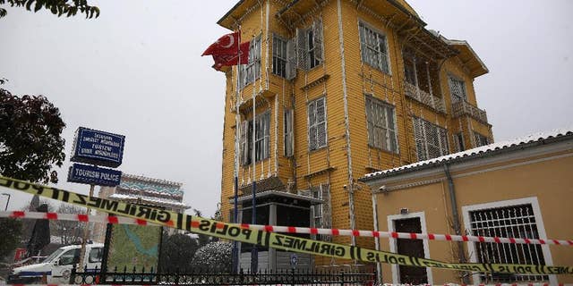 The police station is seen a day after a policeman was killed and another injured when a female suicide bomber blew herself up in Istanbul, Turkey, Wednesday, Jan. 7, 2015. Istanbul governor Vasip Sahin said the woman entered a police station and reported a missing wallet before detonating a bomb. The attack occurred in the Sultan Ahmet district, a popular tourist destination.(AP Photo/Emrah Gurel)