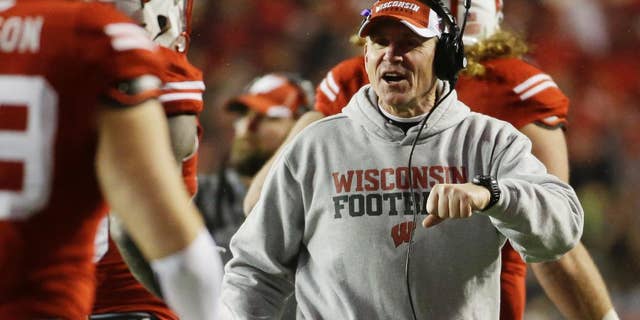 Wisconsin head coach Gary Andersen celebrates after a touchdown during the second half of an NCAA college football game against Nebraska Saturday, Nov. 15, 2014, in Madison, Wis. (AP Photo/Morry Gash)