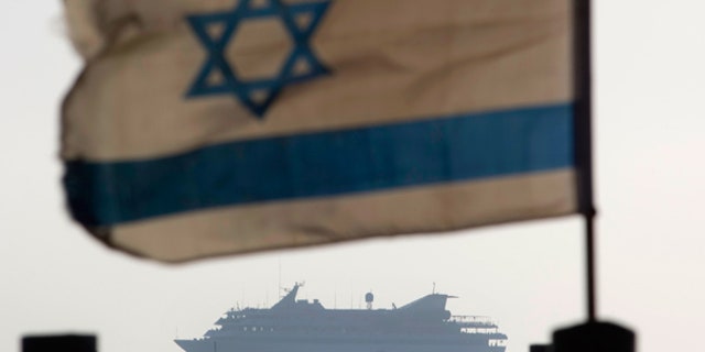 May 31: The Mavi Marmara ship, the lead boat of a flotilla headed to the Gaza Strip which was stormed by Israeli naval commandos, sails into the port of Ashdod, Israel.