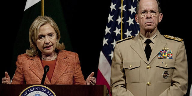 May 27: U.S. Secretary of State Hillary Rodham Clinton addresses a news conference with Adm. Mike Mullen, the chairman of the U.S. Joint Chiefs of Staff at U. S. embassy in Islamabad, Pakistan.