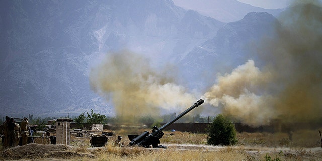 June 1: Pakistani troops fire heavy artillery toward alleged militants hideouts in the mountain ranges in Mamad Gat, in Pakistan's Mohmand tribal region along the Afghan border.