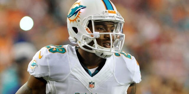 TAMPA, FL - NOVEMBER 11: Cornerback Will Davis #29 of the Miami Dolphins grabs a warmup pass before play against the Tampa Bay Buccaneers November 11, 2013 at Raymond James Stadium in Tampa, Florida. Tampa won 22 - 19. (Photo by Al Messerschmidt/Getty Images)
