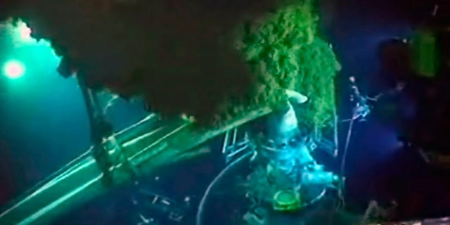 June 2: Underwater robots and other equipment swarm the blowout preventer, bottom left, as oil rises at the site of the Deepwater Horizon spill.