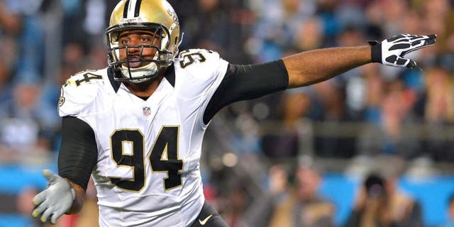 CHARLOTTE, NC - OCTOBER 30: Cameron Jordan #94 of the New Orleans Saints pass rushes against the Carolina Panthers during their game at Bank of America Stadium on October 30, 2014 in Charlotte, North Carolina. The Saints won 28-10. (Photo by Grant Halverson/Getty Images)