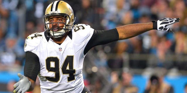 CHARLOTTE, NC - OCTOBER 30: Cameron Jordan #94 of the New Orleans Saints pass rushes against the Carolina Panthers during their game at Bank of America Stadium on October 30, 2014 in Charlotte, North Carolina. The Saints won 28-10. (Photo by Grant Halverson/Getty Images)