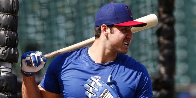 Texas Rangers' Joey Gallo watches during batting practice before the Rangers' baseball game against the Chicago White Sox on Tuesday, June 2, 2015, in Arlington, Texas. (AP Photo/Jim Cowsert)