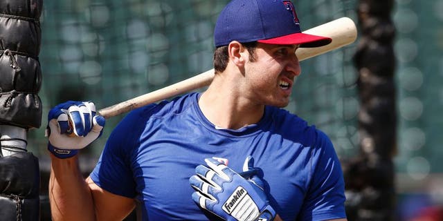 Texas Rangers' Joey Gallo watches during batting practice before the Rangers' baseball game against the Chicago White Sox on Tuesday, June 2, 2015, in Arlington, Texas. (AP Photo/Jim Cowsert)