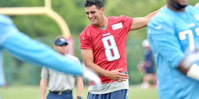 May 15, 2015; Nashville, TN, USA; Tennessee Titans first round draft pick quarterback Marcus Mariota (8) works out during minicamp at Saint Thomas Sports Park. Mandatory Credit: Jim Brown-USA TODAY Sports