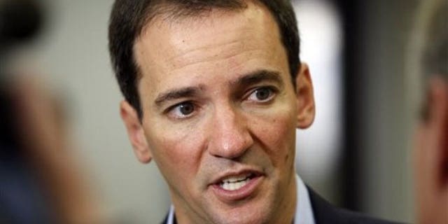 June 3: Andrew Romanoff, U.S. Senate candidate from Colorado, talks to the media during a campaign stop in Denver (AP).