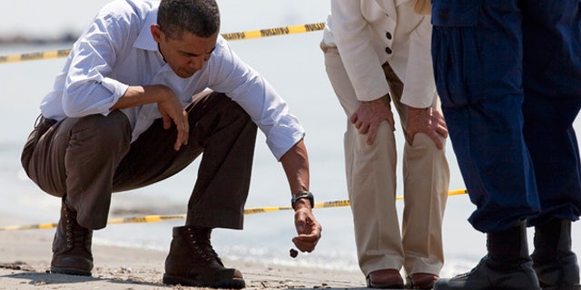 May 28: President Obama picks up a "tar ball" during a tour of areas impacted by the Gulf Coast oil spill in Port Fourchon, La. He returns to the region on Monday.