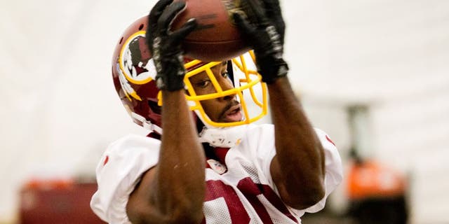 Washington Redskins' Jamison Crowder catches a pass during an NFL football organized team activity at Redskins Park, Wednesday, June 3, 2015, in Ashburn, Va. (AP Photo/Pablo Martinez Monsivais)
