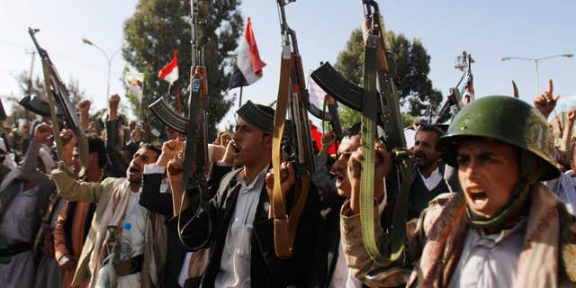 April 16, 2015: Shiite rebels, known as Houthis, chant slogans during a demonstration against an arms embargo imposed by the U.N. Security Council on Houthi leaders, in Sanaa, Yemen.