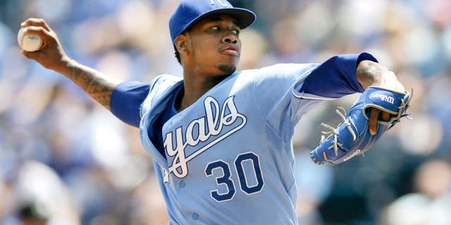 Kansas City Royals starting pitcher Yordano Ventura delivers to a Texas Rangers batter during the first inning of a baseball game at Kauffman Stadium in Kansas City, Mo., Saturday, June 6, 2015. (AP Photo/Orlin Wagner)
