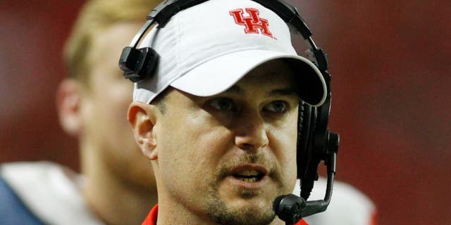 Dec 31, 2015; Atlanta, GA, USA; Houston Cougars head coach Tom Herman looks on from the sidelines against the Florida State Seminoles in the fourth quarter in the 2015 Chick-fil-A Peach Bowl at the Georgia Dome. The Cougars won 38-24. Mandatory Credit: Brett Davis-USA TODAY Sports