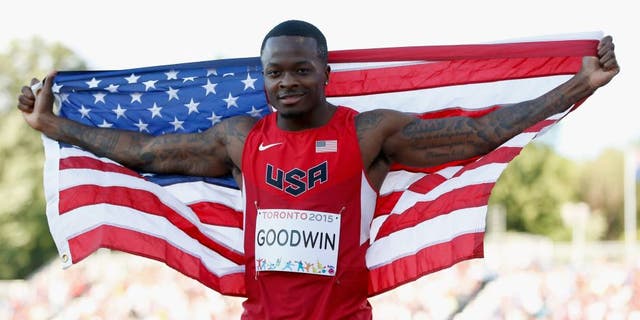 TORONTO, ON - JULY 22: Marquise Goodwin of the United States holds the American flag after winning the silver medal in the men's long jump during Day 12 of the Toronto 2015 Pan Am Games on July 22, 2015 in Toronto, Canada. (Photo by Ezra Shaw/Getty Images)