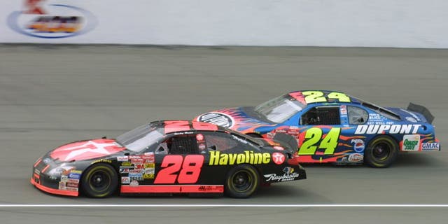 10 JUN 2001: Ricky Rudd in his #28 Texaco Havoline Ford Taurus passes Jeff Gordon only to be passed back and finish second during the NASCAR Winston Cup Series Kmart 400 at Michigan International Speedway in Brooklyn, Michigan. DIGITAL IMAGE Mandatory Credit: Robert Laberge/ALLSPORT
