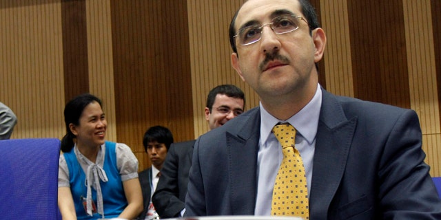 June 6: Syria's ambassador to Austria, Bassam al-Sabbagh, waits for the start of the board of governors meeting of the International Atomic Energy Agency, IAEA, at the International Center, in Vienna, Austria.