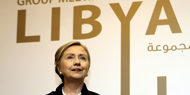 June 9: Secretary of State Hillary Clinton talks to journalists during the third meeting of Contact Group on Libya in Abu Dhabi, United Arab Emirates.