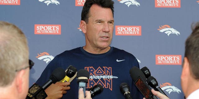 June 9, 2015; Englewood, CO, USA; Denver Broncos head coach Gary Kubiak speaks to the media following mini camp activities at the Broncos training facility. Mandatory Credit: Ron Chenoy-USA TODAY Sports
