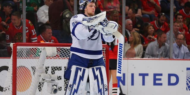 Jun 10, 2015; Chicago, IL, USA; Tampa Bay Lightning goalie Andrei Vasilevskiy (88) during a break in the second period in game four of the 2015 Stanley Cup Final against the Chicago Blackhawks at United Center. Mandatory Credit: Dennis Wierzbicki-USA TODAY Sports
