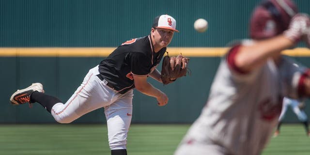 Oklahoma State pitcher Tyler Buffett delivers a pitch during an NCAA college baseball tournament super regional game against South Carolina on Sunday, June 12, 2016, in Columbia, S.C. (AP Photo/Sean Rayford)
