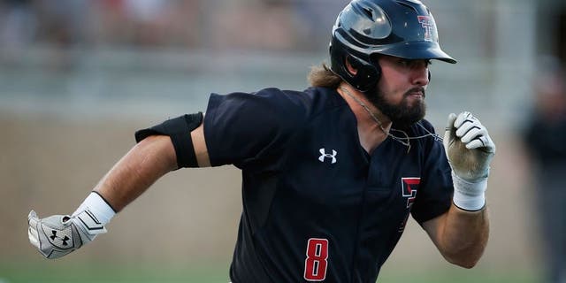 Texas Tech's Tanner Gardner runs to first on a single against East Carolina during an NCAA college baseball tournament super regional game Friday, June 10, 2016, in Lubbock, Texas. (Brad Tollefson/Lubbock Avalanche-Journal via AP) ALL LOCAL TELEVISION OUT; MANDATORY CREDIT