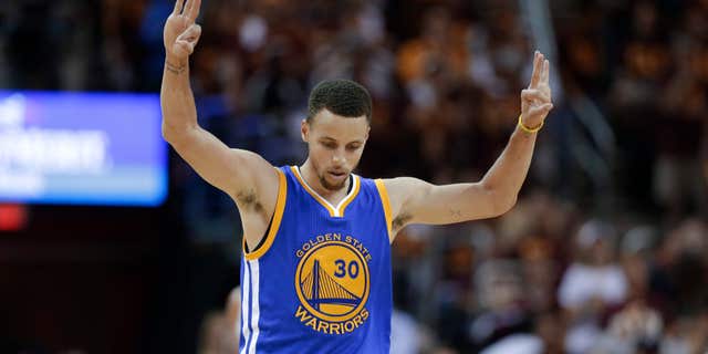 June 10, 2016: Golden State Warriors guard Stephen Curry celebrates a basket against the Cleveland Cavaliers during the second half of Game 4 of basketball's NBA Finals in Cleveland.